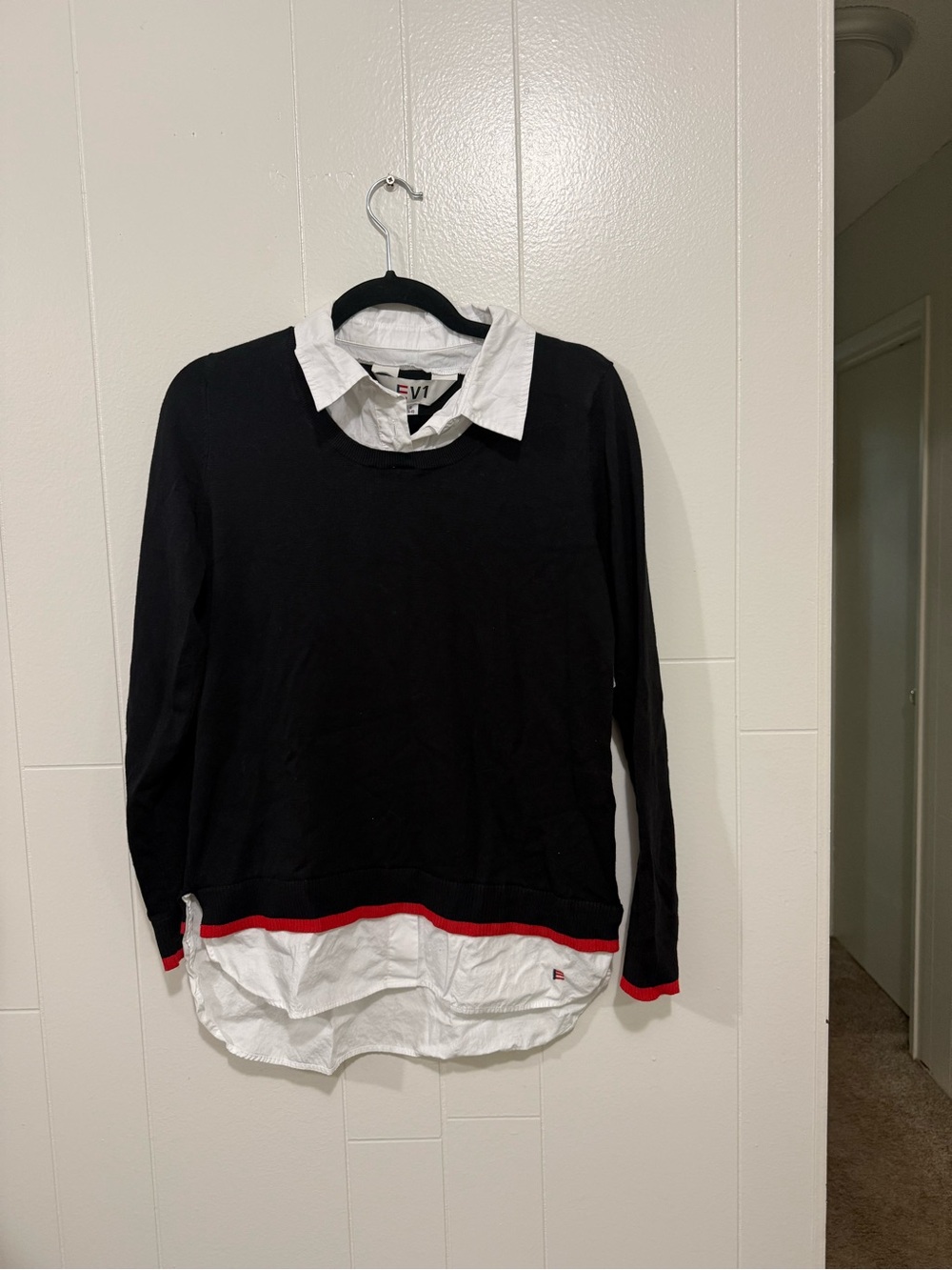 EV1 Black Top with White Shirt-Layer Detail and Red Logo Accent